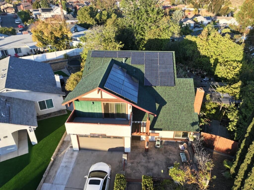 Roof replacement using Owens Corning TruDefinition Duration shingles. Uninstalled and reinstalled solar panels. Replaced a lot of wood fascia.