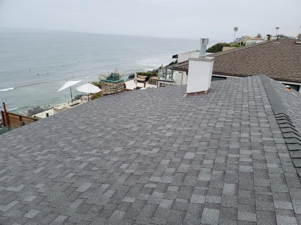 Not much of the roof is visible on the side of the home facing the ocean, but this is the side that takes a brutal beating during the winter storms. It was essential to use an asphalt shingle with a high wind resistance rating.