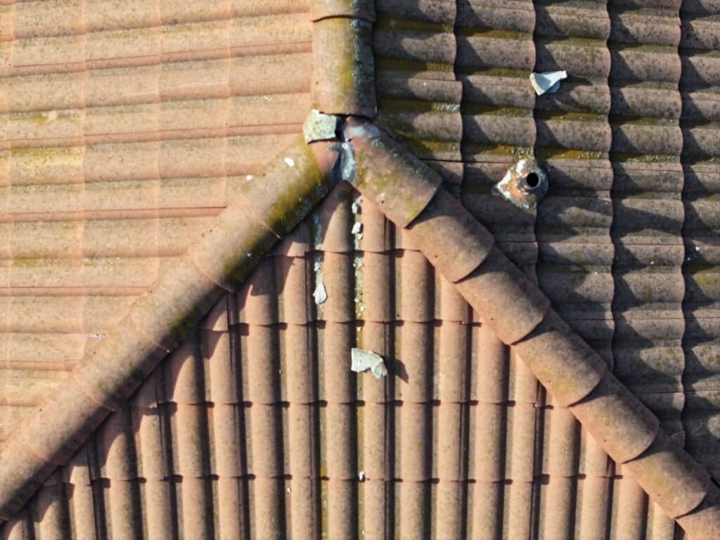 Broken mortar creates falling debris and allows water intrusion.