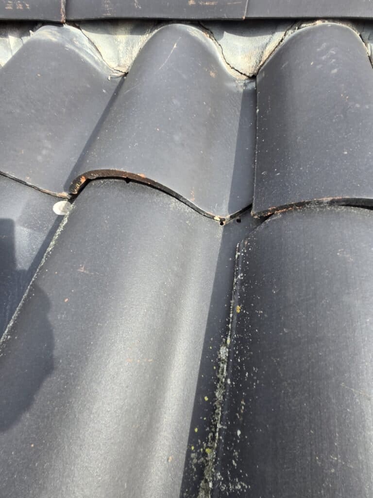 Roof Inspection on Passiflora Avenue, Encinitas, CA Exposed nails due to insufficient overlap on the tiles.