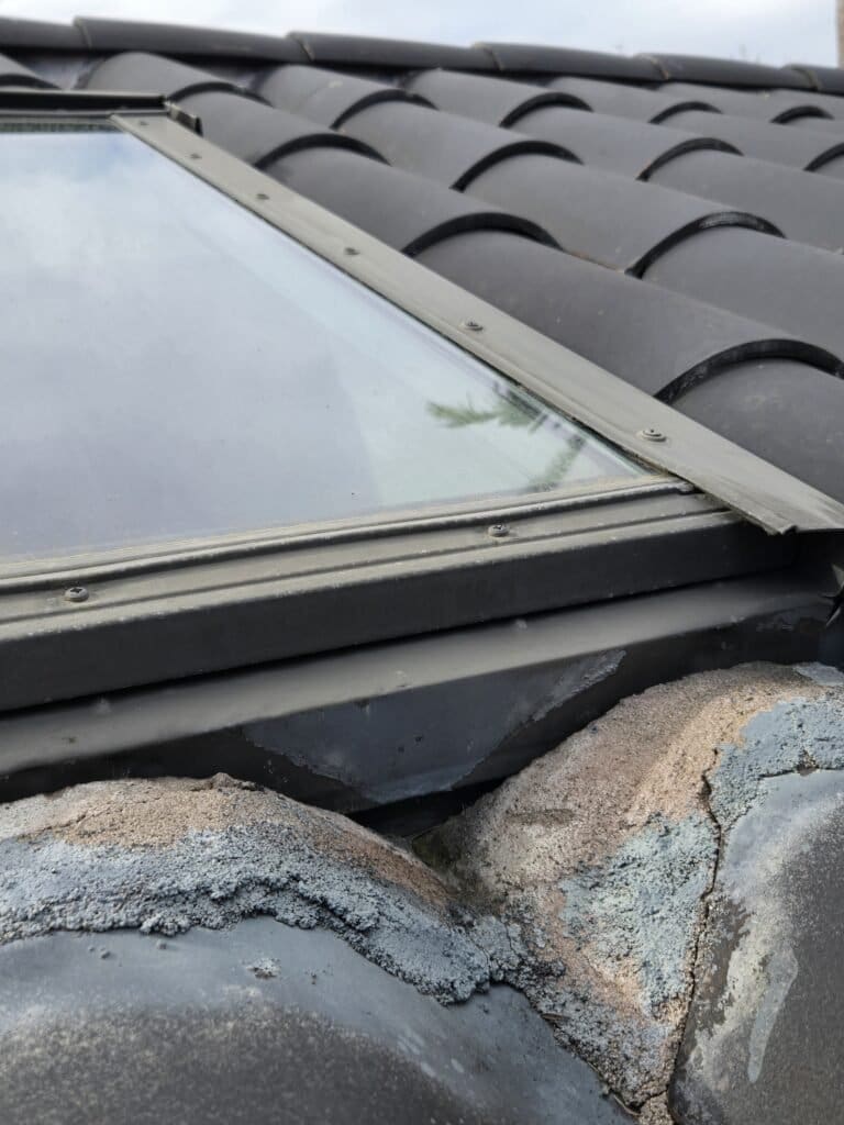 Roof Inspection on Passiflora Avenue, Encinitas, CA It is impossible to install roof-to-wall metal at the front of the skylight.