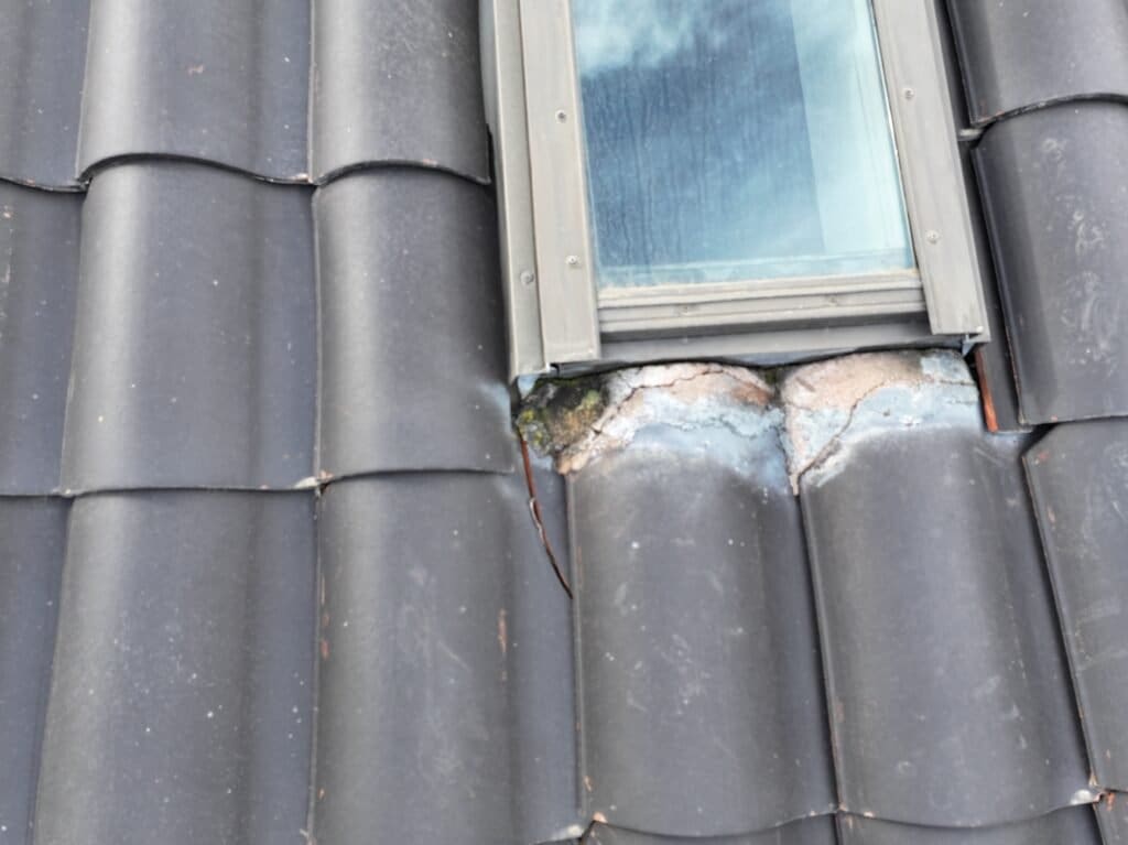 Roof Inspection on Passiflora Avenue, Encinitas, CA Curb height is too low for this skylight. No roof-to-wall metal is installed.