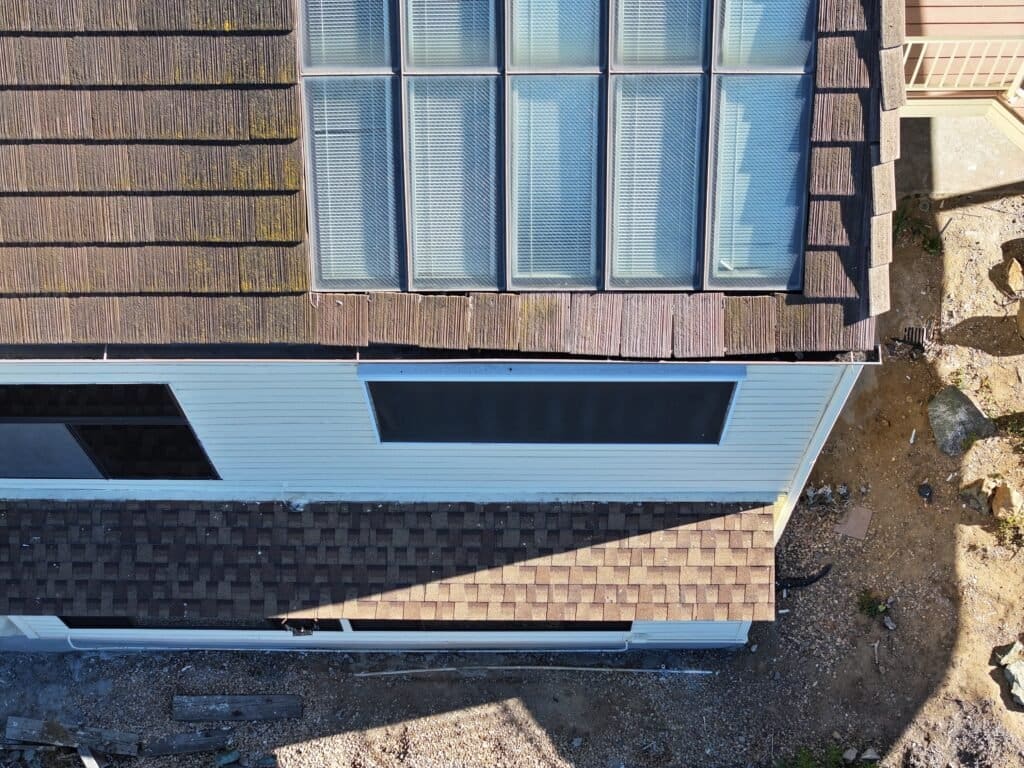 Roof Repair in San Diego (Del Cerro) on Linda Lane homemade skylight, loose roof tiles, this house in San Diego needs some roof repair.