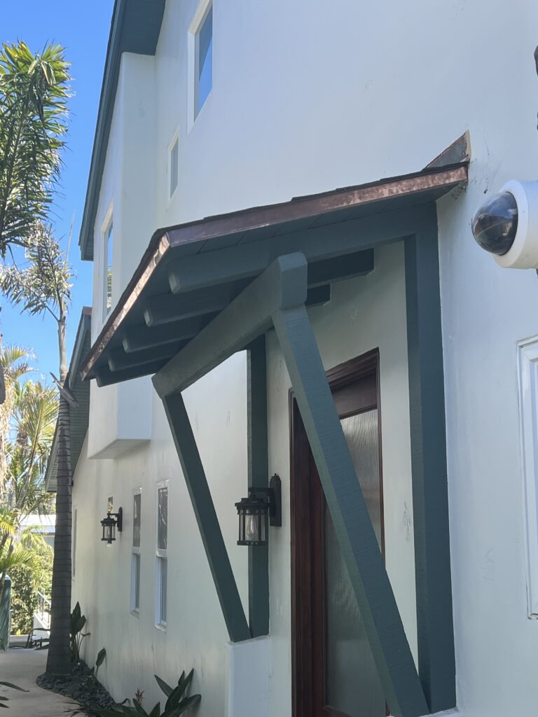Not much of the roof is visible on the side of the home facing the ocean, but this is the side that takes a brutal beating during the winter storms. It was essential to use an asphalt shingle with a high wind resistance rating.