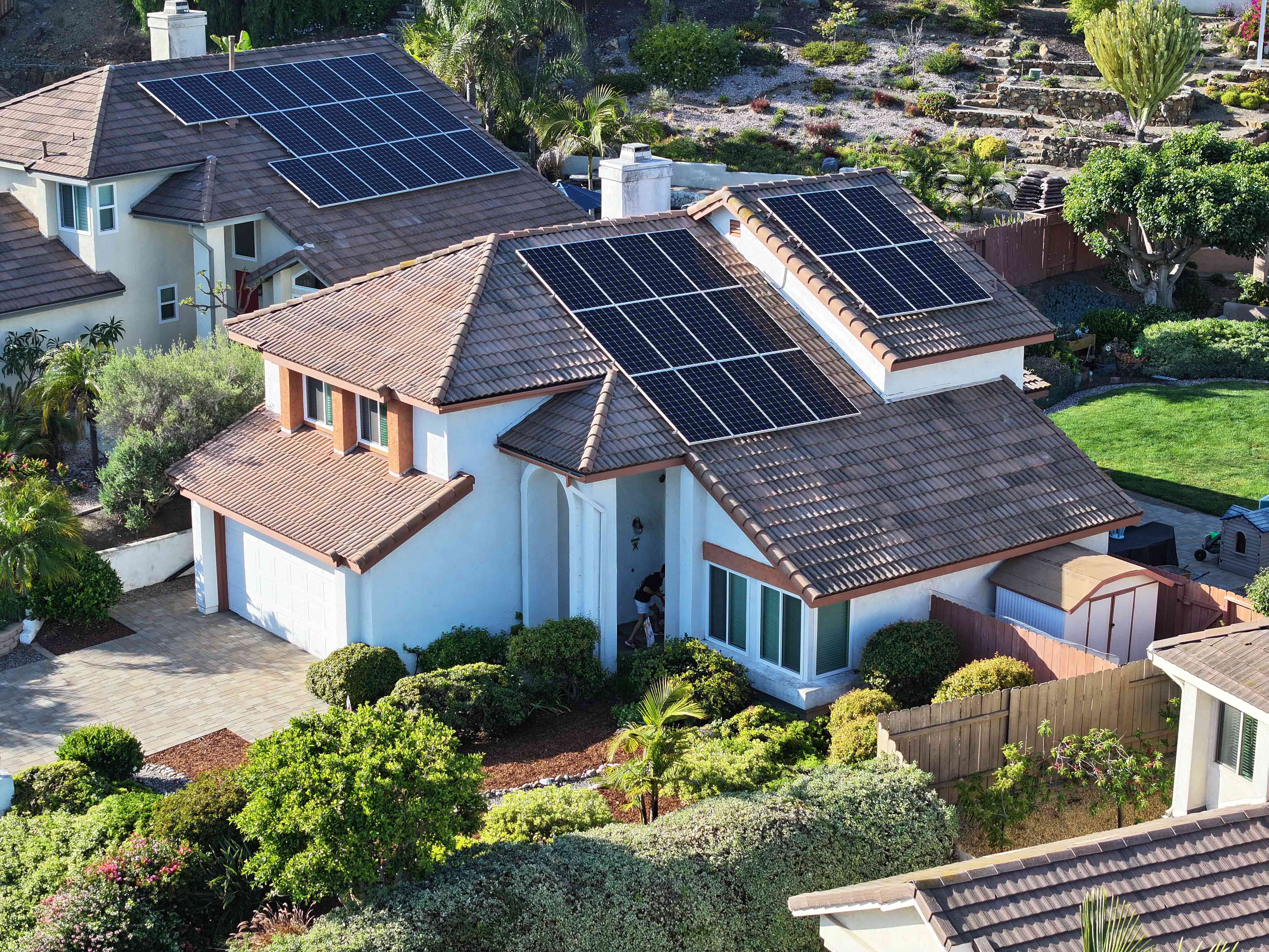 Re-roof San Diego This house was reroofed by Richardson Roofing. It is a concrete Villa tile with solar panels.