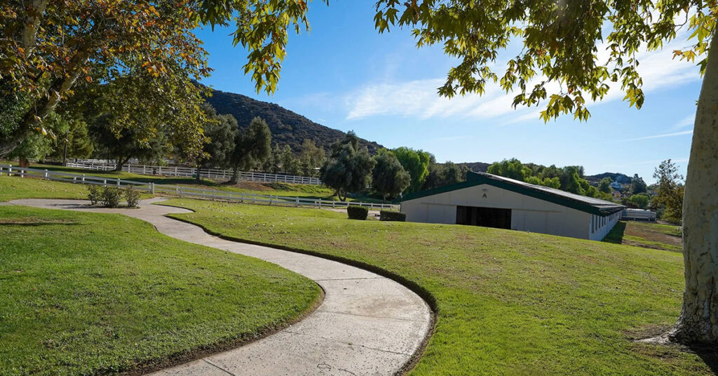 Commercial roof replacement on equestrian horse barns in San Diego Country Estates by Richardson Roofing.